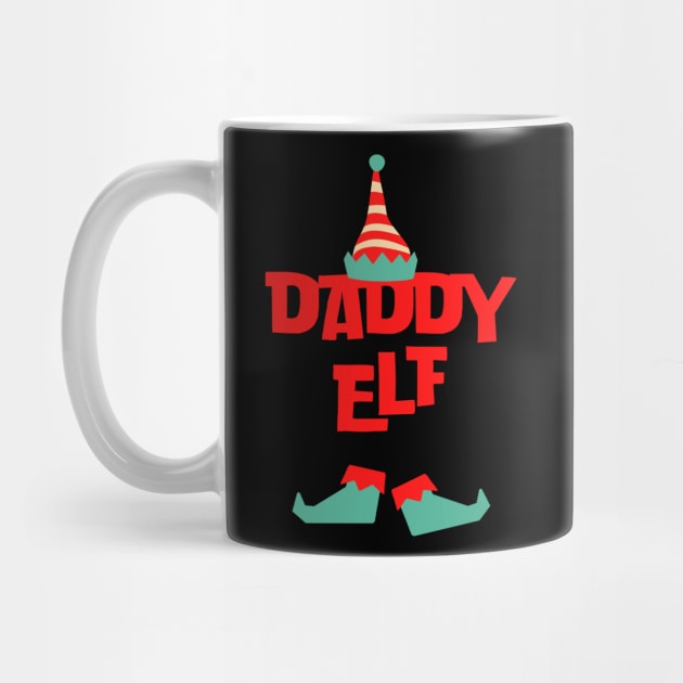 Daddy elf by the christmas shop